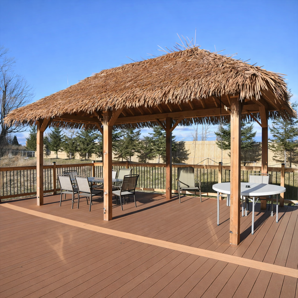 Wooden gazebo with DuraFlex Synthetic thatched roof on a wooden deck.